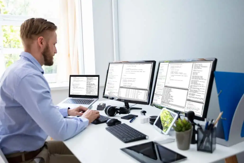 Public adjuster working on a propertly loss insurance claim at his desk