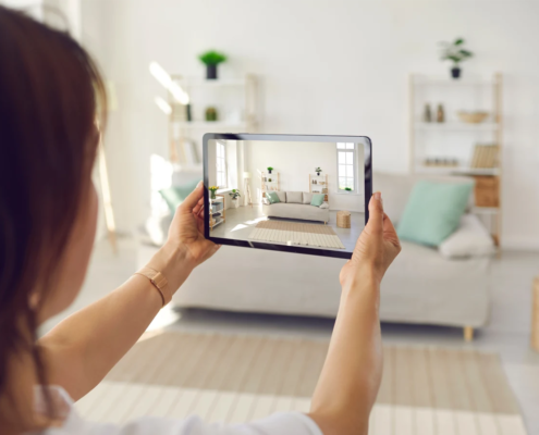 Person taking photo of room contents